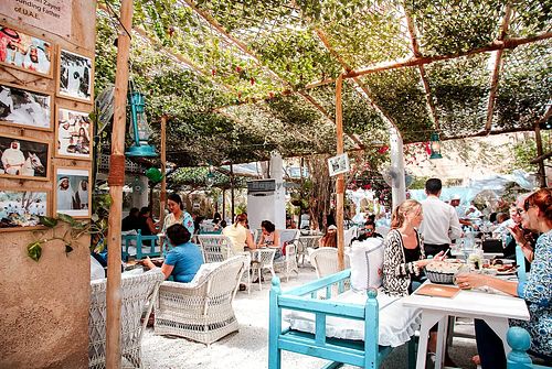 Serene outdoor seating at Arabian Tea House Top Restaurants in Dubai