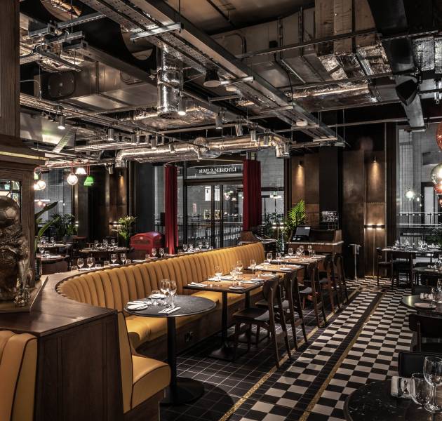 Guests enjoying their meal at Bread Street Kitchen Top Restaurants in Dubai